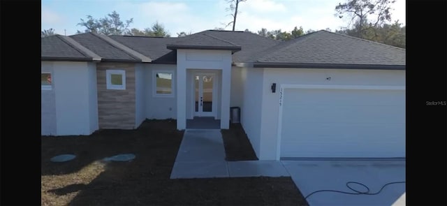 ranch-style home with a garage