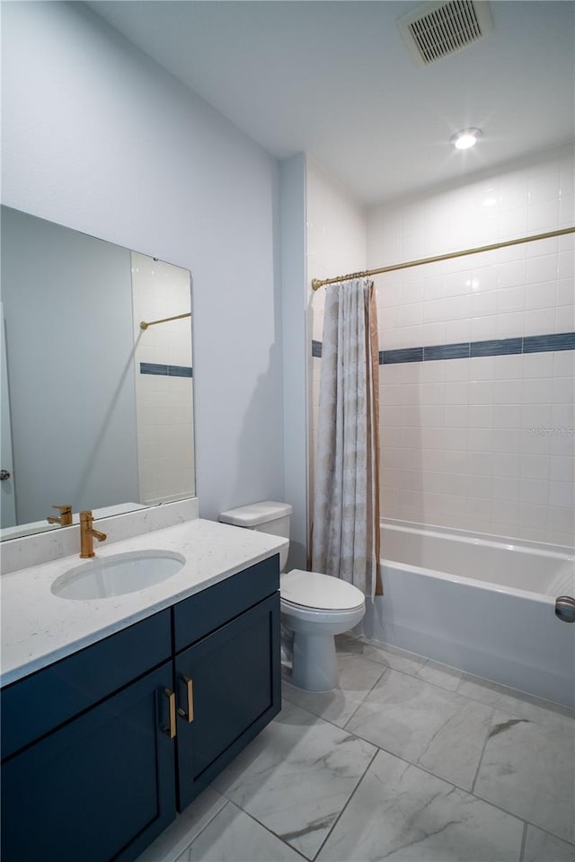 full bath featuring marble finish floor, visible vents, toilet, shower / tub combo, and vanity