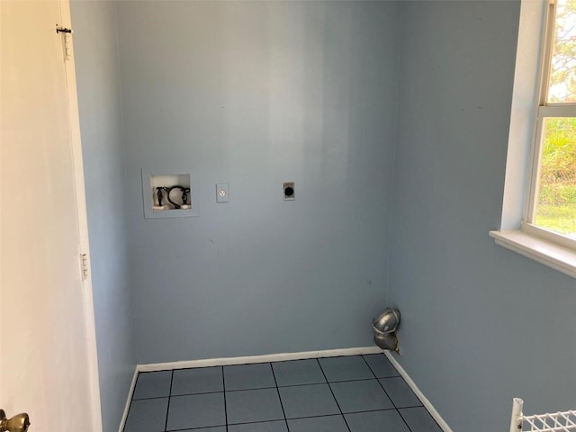 laundry area featuring washer hookup, hookup for an electric dryer, and tile patterned flooring