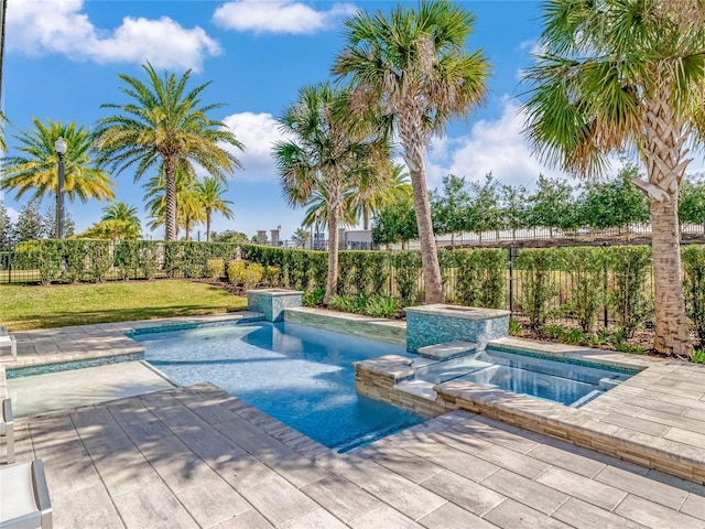 view of swimming pool featuring an in ground hot tub