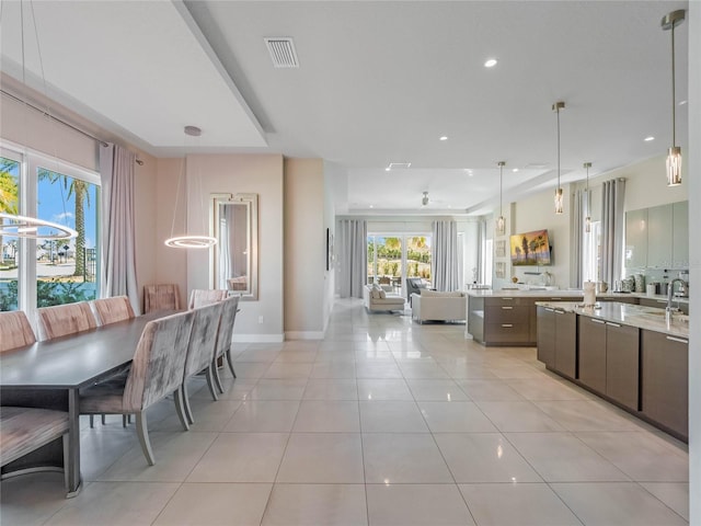 dining room featuring light tile patterned floors