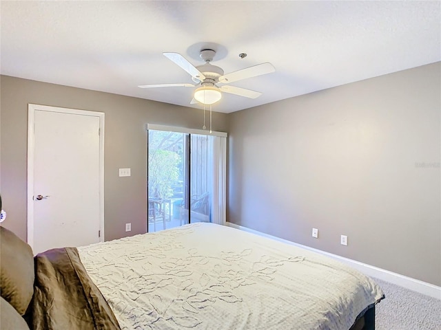 bedroom featuring ceiling fan, carpet, and access to outside