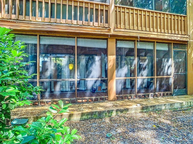 view of property exterior with a balcony