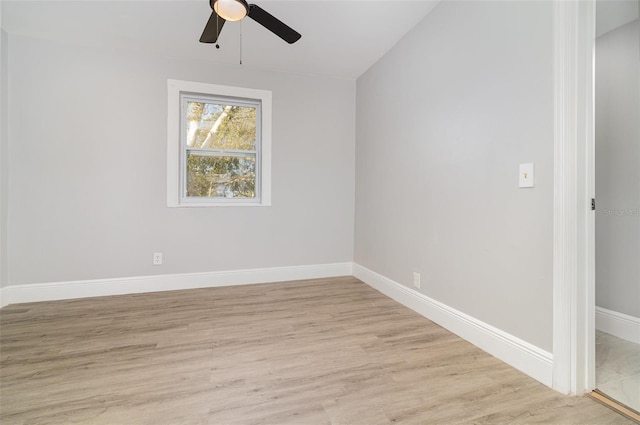 spare room featuring ceiling fan and light hardwood / wood-style floors