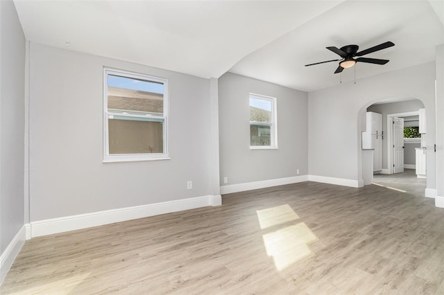 spare room with ceiling fan and light hardwood / wood-style floors