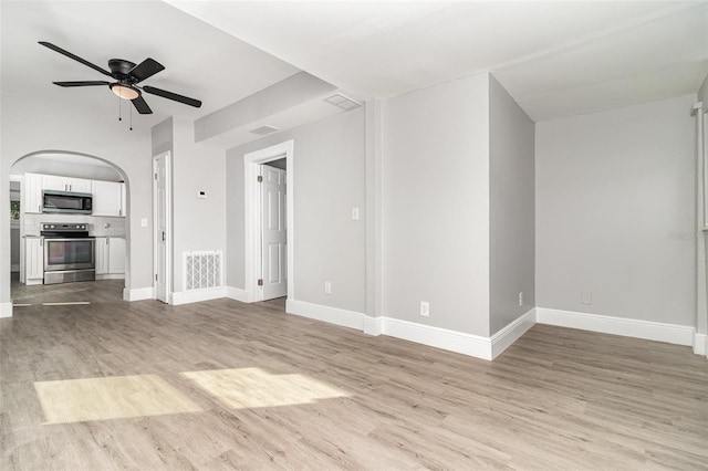 unfurnished living room featuring light hardwood / wood-style floors and ceiling fan