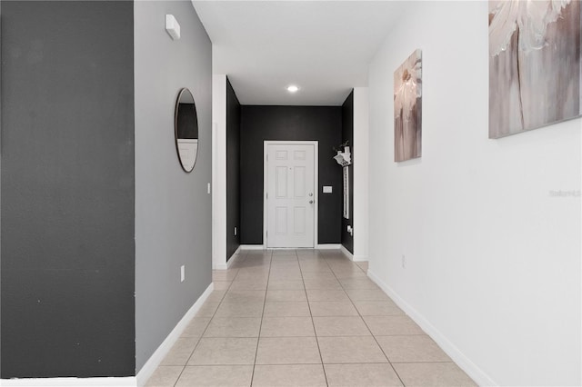 hall with light tile patterned flooring