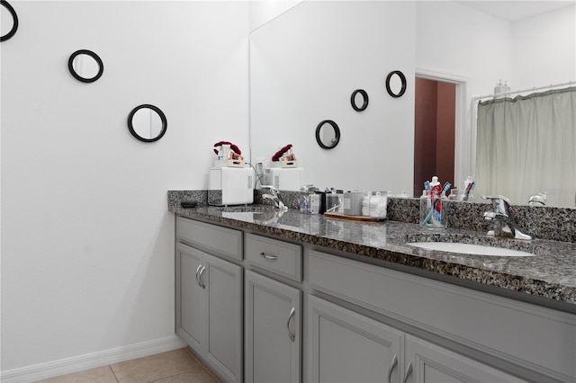 bathroom featuring vanity and tile patterned flooring