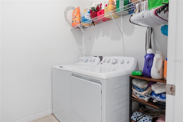 washroom with independent washer and dryer