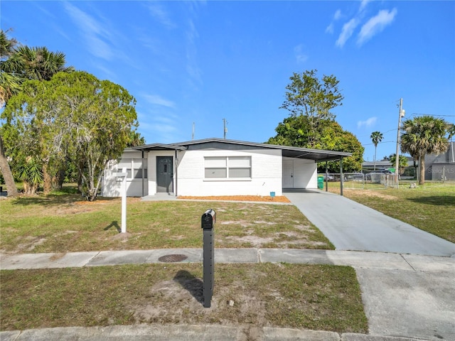 single story home with a carport and a front yard