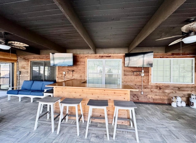 view of patio with an outdoor bar