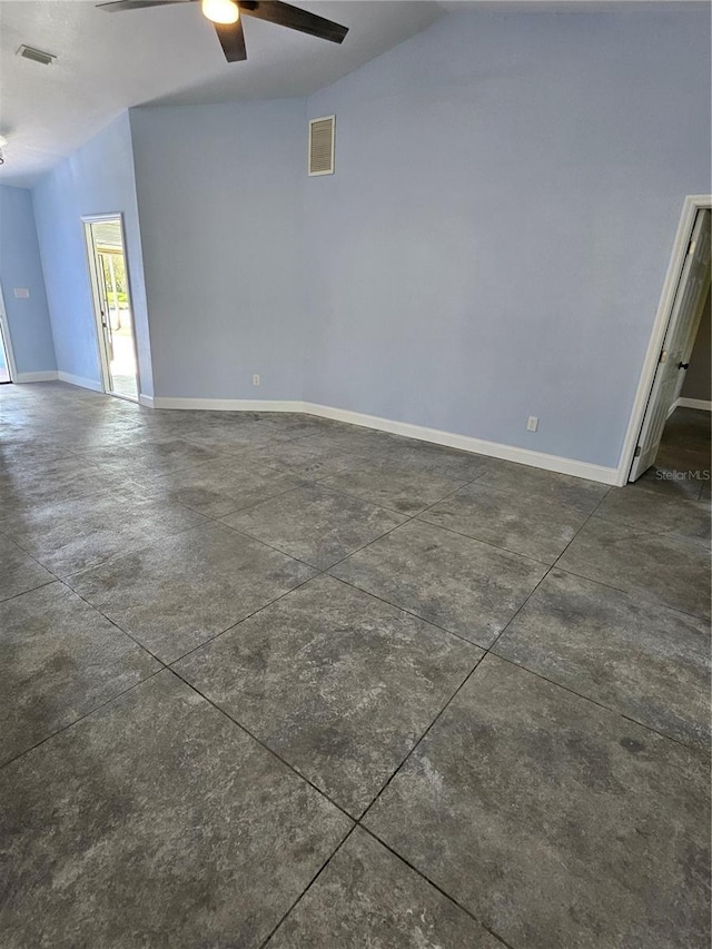 spare room featuring lofted ceiling and ceiling fan