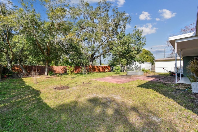 view of yard featuring a patio area and fence