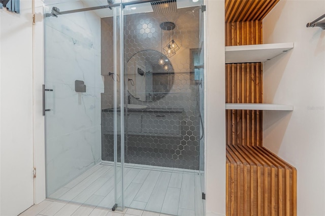 bathroom featuring an enclosed shower