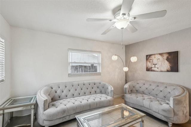 living room featuring ceiling fan