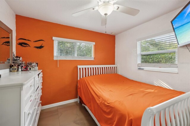 bedroom featuring ceiling fan