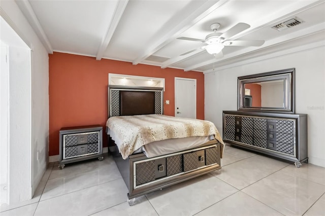 tiled bedroom with beamed ceiling and ceiling fan