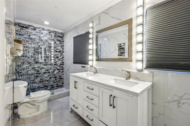 bathroom with tiled shower, toilet, tile walls, ornamental molding, and vanity