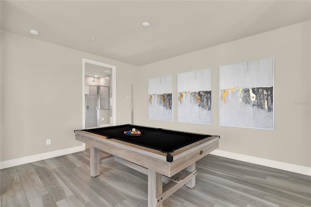 recreation room with billiards and hardwood / wood-style floors