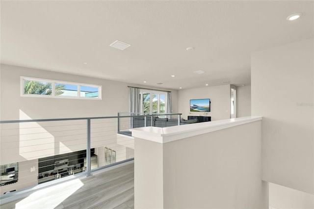 interior space featuring kitchen peninsula and light wood-type flooring