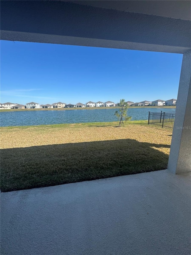 view of yard with a water view