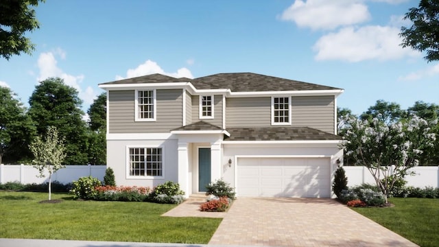 view of front facade featuring a garage and a front yard