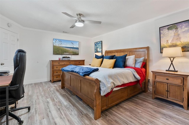 bedroom with crown molding, ceiling fan, and light wood-type flooring