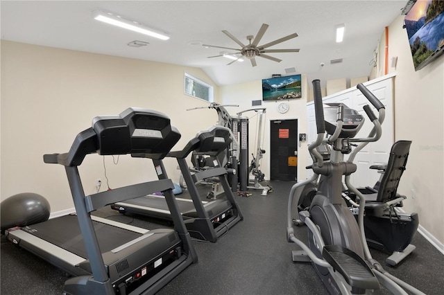 workout area with ceiling fan and vaulted ceiling