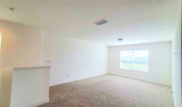 empty room with carpet floors