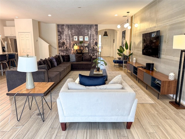 living room featuring a textured ceiling