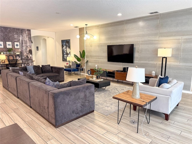 living room featuring a textured ceiling