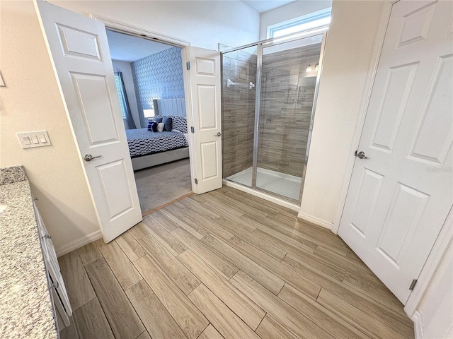 bathroom featuring vanity and walk in shower