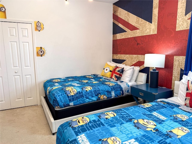 carpeted bedroom featuring a closet