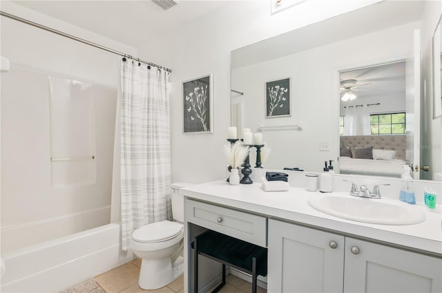 full bathroom with vanity, shower / tub combo, tile patterned floors, and toilet