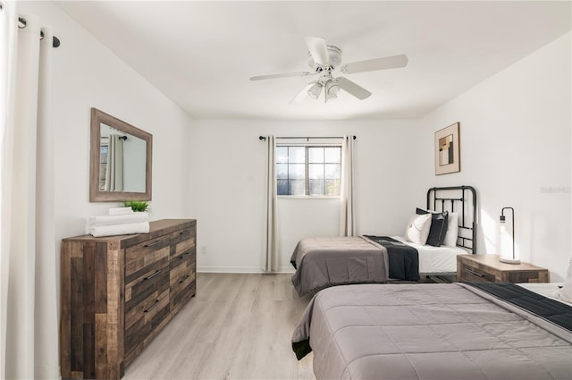 bedroom featuring ceiling fan and light wood-type flooring