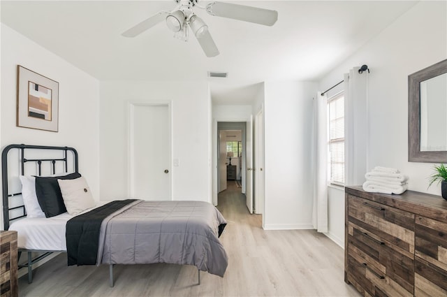 bedroom featuring ceiling fan and light wood-type flooring