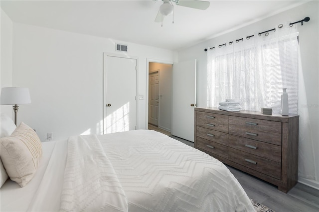 bedroom featuring ceiling fan and light wood-type flooring