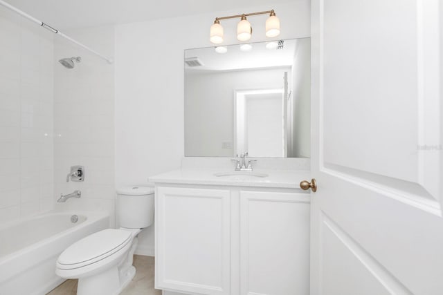 full bathroom featuring tiled shower / bath combo, vanity, and toilet