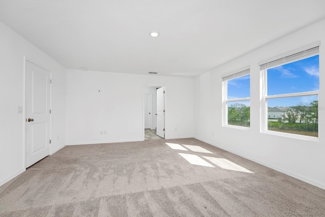 view of carpeted spare room