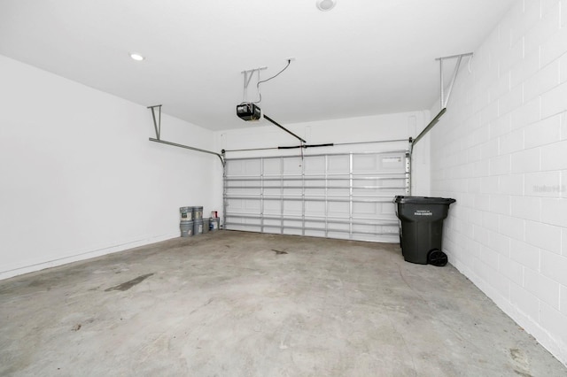 garage featuring a garage door opener