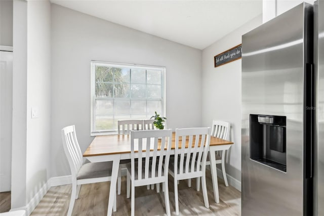 dining room with light wood-type flooring