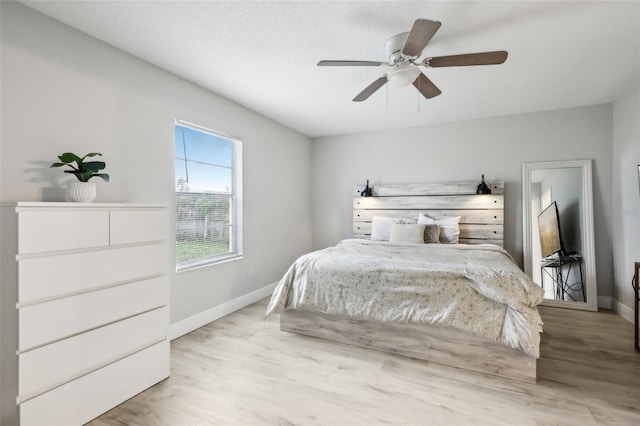 bedroom featuring ceiling fan and light wood-type flooring