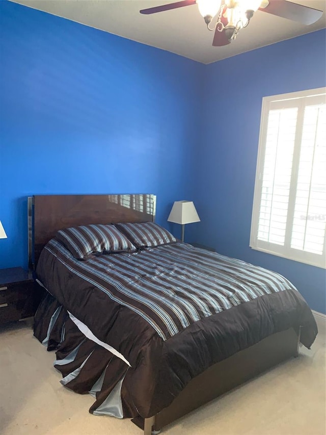 bedroom with carpet floors and ceiling fan