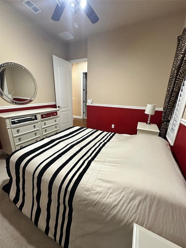 bedroom with visible vents and ceiling fan