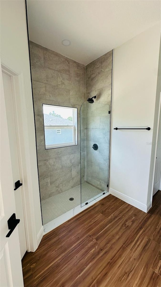 11 Spruce Ln, Ocala, FL 34472 - full bath with wood finished floors and a walk in shower