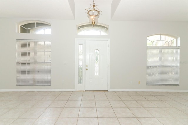 tiled entryway featuring a healthy amount of sunlight