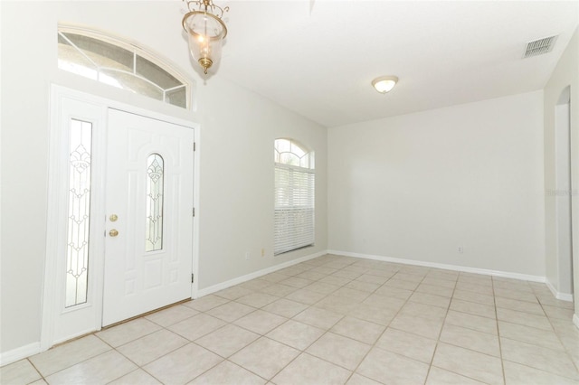 view of tiled foyer entrance