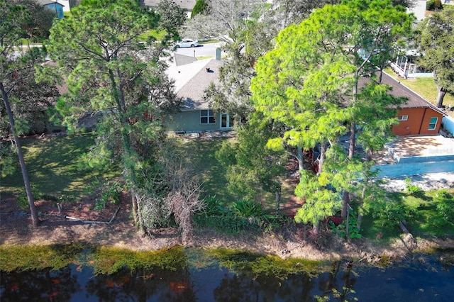 birds eye view of property featuring a water view