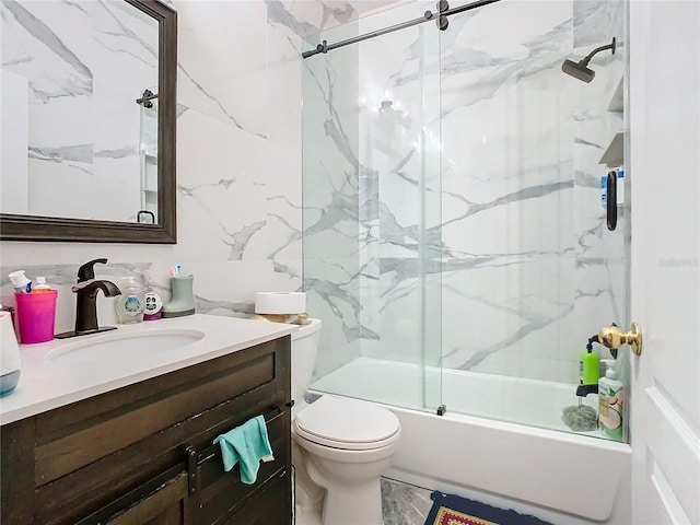 bathroom with toilet, bath / shower combo with glass door, and vanity