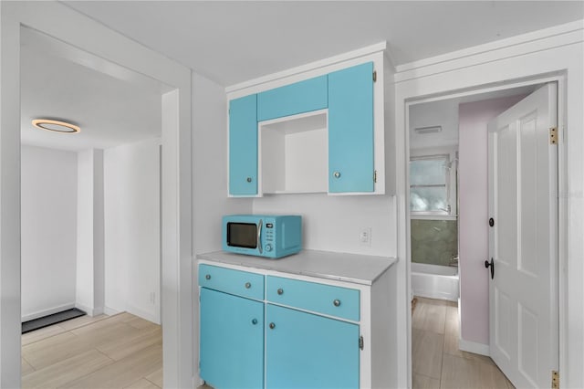 kitchen with blue cabinets